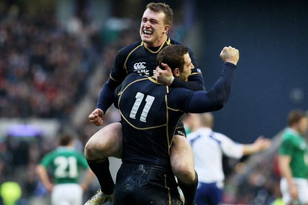 EDINBURGH, SCOTLAND - FEBRUARY 24:  Scotland teammates Tim Visser (#11) and Stuart Hogg celebrate their team's victory as the final whistle blows during the RBS Six Nations match between Scotland and Ireland at Murrayfield Stadium on February 24, 2013 in Edinburgh, Scotland.  (Photo by David Rogers/Getty Images)