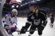 New York Rangers center Derick Brassard, left, and Los Angeles Kings center Tyler Toffoli battle for the puck during the second overtime period in Game 2 of the NHL hockey Stanley Cup Finals, Saturday, June 7, 2014, in Los Angeles. The Kings won 5-4. (AP Photo/Mark J. Terrill)