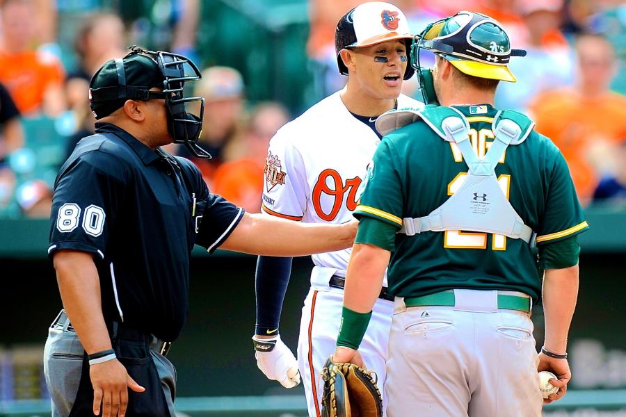 Baltimore Orioles' Manny Machado smiles after teammate Adam Jones hit him  in the face with a pie after a baseball game against the Oakland Athletics  in Baltimore, Wednesday, Aug. 23, 2017. (AP