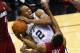 SAN ANTONIO, TX - JUNE 5: Kawhi Leonard #2 of the San Antonio Spurs is fouled while shooting by Norris Cole #30 of the Miami Heat in Game One of the 2014 NBA Finals at the AT&T Center on June 5, 2014 in San Antonio, Texas. NOTE TO USER: User expressly acknowledges and agrees that, by downloading and/or using this photograph, user is consenting to the terms and conditions of the Getty Images License Agreement. (Photo by Chris Covatta/Getty Images)