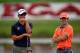 PALM BEACH GARDENS, FL - FEBRUARY 27: Rory McIlroy of Northern Ireland (R) and Adam Scott of Australia talk to one another during the first round of The Honda Classic at PGA National Resort and Spa on February 27, 2014 in Palm Beach Gardens, Florida. (Photo by Stuart Franklin/Getty Images)
