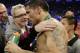 Trainer Freddie Roach talks with Sergio Martinez, of Argentina, after a WBC World Middleweight Title boxing match against Miguel Cotto, of Puerto Rico, Sunday, June 8, 2014, in New York. Cotto won the fight. (AP Photo/Frank Franklin II)