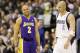 Los Angeles Lakers' Derek Fisher (2) and Dallas Mavericks' Jason Kidd, right, during an NBA basketball game, Wednesday, Feb. 24, 2010, in Dallas. (AP Photo/Tony Gutierrez)