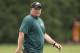 Philadelphia Eagles head coach Chip Kelly walks off the field after an NFL football organized team activity Monday, June 9, 2014, in Philadelphia. (AP Photo/Matt Rourke)