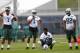FLORHAM PARK, NJ - MAY 16: Wide Receivers Lavasier Tuinei #7,Jermaine Jones #1, Jalen Saunders #16 and Quincy Enunwa #82 of the New York Jets look on during the first day of rookie minicamp on May 16, 2014 in Florham Park, New Jersey. (Photo by Rich Schultz /Getty Images)