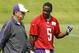 Minnesota Vikings quarterback Teddy Bridgewater (5) talks with offensive coordinator Norv Turner during an NFL organized training activity in Eden Prairie, Minn., Wednesday, June 11, 2014. (AP Photo/Ann Heisenfelt)