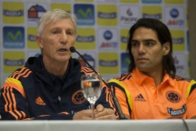 Colombia's national soccer team coach Jose Pekerman, left, announces the roster of players for the Brazil 2014 World Cup, with Colombian star Radamel Falcao Garcia sitting next to him, in Buenos Aires, Argentina, Monday, June 2, 2014. Falcao will not play in this World Cup as Pekerman did not include him in the final team roster. (AP Photo/Eduardo Di Baia)