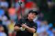 PINEHURST, NC - JUNE 12: Phil Mickelson of the United States watches his tee shot on the 13th hole during the first round of the 114th U.S. Open at Pinehurst Resort & Country Club, Course No. 2 on June 12, 2014 in Pinehurst, North Carolina. (Photo by David Cannon/Getty Images)