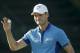 Martin Kaymer, of Germany, waves after shooting 65 in the first round of the U.S. Open golf tournament in Pinehurst, N.C., Thursday, June 12, 2014. (AP Photo/David Goldman)