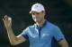 Martin Kaymer, of Germany, waves after shooting 65 in the first round of the U.S. Open golf tournament in Pinehurst, N.C., Thursday, June 12, 2014. (AP Photo/David Goldman)