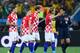 SAO PAULO, BRAZIL - JUNE 12: Referee Yuichi Nishimura is pursued by Dejan Lovren, Sime Vrsaljko, Nikica Jelavic and Ivan Rakitic of Croatia after awarding a penalty kick during the 2014 FIFA World Cup Brazil Group A match between Brazil and Croatia at Arena de Sao Paulo on June 12, 2014 in Sao Paulo, Brazil. (Photo by Christopher Lee/Getty Images)
