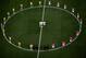 SAO PAULO, BRAZIL - JUNE 12: Brazil and Croatia players stand around the center circle as doves are released before the 2014 FIFA World Cup Brazil Group A match between Brazil and Croatia at Arena de Sao Paulo on June 12, 2014 in Sao Paulo, Brazil. (Photo by Fabrizio Bensch - Pool/Getty Images)