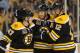 BOSTON, MA - APRIL 12: Torey Krug #47, David Krejci #46 and Jarome Iginla #12 of the Boston Bruins celebrate a goal against the Buffalo Sabres at the TD Garden on April 12, 2014 in Boston, Massachusetts. (Photo by Brian Babineau/NHLI via Getty Images)