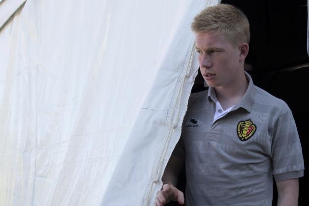 Belgium midfielder Kevin De Bruyne leaves at the end of a press conference at the team's training facility, in Mogi Das Cruzes, Brazil, Thursday, June 12, 2014. Belgium plays in the group H of the 2014 soccer World Cup. (AP Photo/Andrew Medichini)
