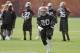 Cleveland Browns running back Terrance West runs the ball during organized team activities at the NFL football team's facility in Berea, Ohio Tuesday, June 3, 2014. (AP Photo/Mark Duncan)