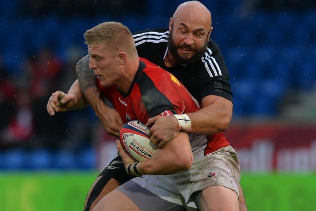 GLASGOW, SCOTLAND - MAY 04: Ben Lam of New Zealand tackles John Moonlight of Canada during the IRB Glasgow Sevens - Day Two at Scotstoun Stadium on May 4 2014 in Glasgow, Scotland. (Photo by Mark Runnacles/Getty Images)