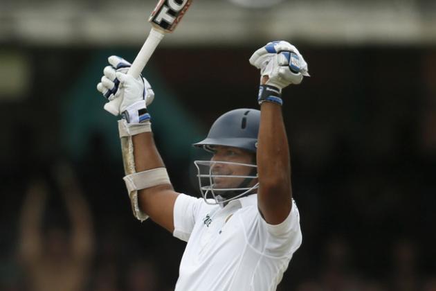 Sri Lanka's Kumar Sangakkara celebrates his 100 runs not out, on the third day of the first test cricket match between England and Sri Lanka at Lord's cricket ground in London, Saturday, June, 14, 2014. (AP Photo/Alastair Grant)