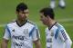 Argentina's Sergio Aguero, left, talks with teammate Lionel Messi during a training session in Vespasiano, near Belo Horizonte, Brazil, Thursday, June 12, 2014. Argentina will play in group F of the Brazil 2014 soccer World Cup. (AP Photo/Victor R. Caivano)