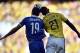 Greece's Sokratis Papastathopoulos, left, heads the ball against Colombia's Jackson Martinez during the group C World Cup soccer match between Colombia and Greece at the Mineirao Stadium in Belo Horizonte, Brazil, Saturday, June 14, 2014. Colombia won 3-0. (AP Photo/Martin Meissner)