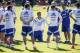 Argentina's Lionel Messi, center, kneels after putting on his shoes as the team gathers at centerfield at the start of a training session in Vespasiano, near Belo Horizonte, Brazil, Friday, June, 13, 2014. Argentina will play in group F of the Brazil 2014 soccer World Cup. (AP Photo/Victor R. Caivano)
