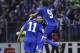 Bosnia's player Pjanic Miralem, center, celebrates his goal against Lithuania, during their World Cup 2014 Group G qualifying soccer match at Stadium Bilino Polje in Zenica, Bosnia, on Tuesday, Oct. 16, 2012. (AP Photo/Amel Emric)
