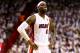 MIAMI, FL - JUNE 12: LeBron James #6 of the Miami Heat looks on against the San Antonio Spurs during Game Four of the 2014 NBA Finals at American Airlines Arena on June 12, 2014 in Miami, Florida. NOTE TO USER: User expressly acknowledges and agrees that, by downloading and or using this photograph, User is consenting to the terms and conditions of the Getty Images License Agreement. (Photo by Andy Lyons/Getty Images)