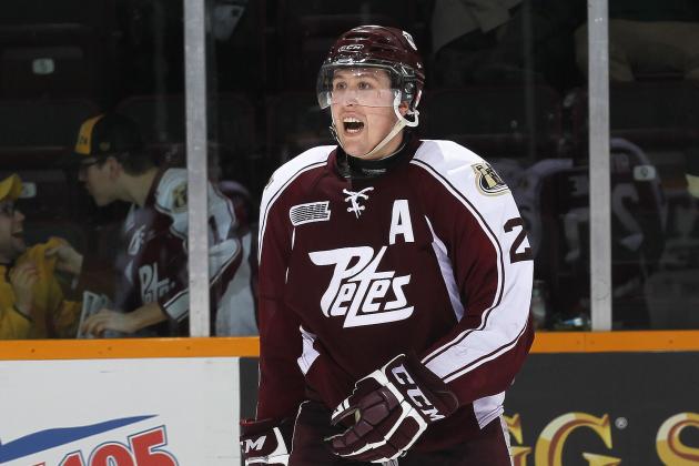 PETERBOROUGH, ON - FEBRUARY 20: Nick Ritchie #20 of the Peterborough Petes celebrates his empty net goal against the Saginaw Spirit during an OHL game at the Memorial Centre on February 20, 2014 in Peterborough, Ontario, Canada. The Petes defeated the Spirit 5-2. (Photo by Claus Andersen/Getty Images)