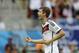 Germany's Thomas Mueller runs off the pitch during the second half after scoring his side's fourth goal during the group G World Cup soccer match between Germany and Portugal at the Arena Fonte Nova in Salvador, Brazil, Monday, June 16, 2014. (AP Photo/Natacha Pisarenko)