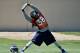 Denver Broncos' Quinton Carter stretches during an NFL football organized team activity, Wednesday, May 28, 2014, in Englewood, Colo. (AP Photo/Jack Dempsey)