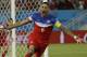 United States' Clint Dempsey celebrates after scoring the opening goal during the group G World Cup soccer match between Ghana and the United States at the Arena das Dunas in Natal, Brazil, Monday, June 16, 2014. The United States won the match 2-1. (AP Photo/Ricardo Mazalan)