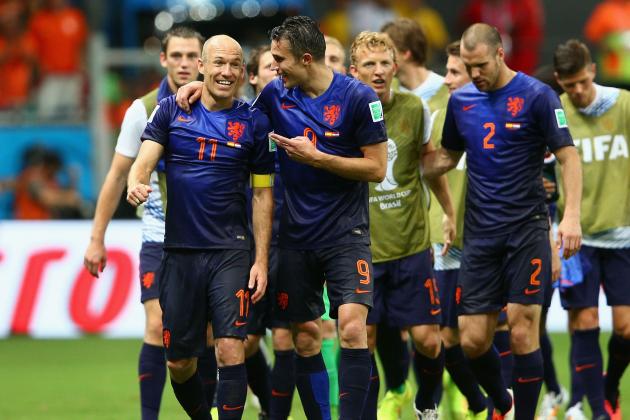 SALVADOR, BRAZIL - JUNE 13: Arjen Robben and Robin van Persie of the Netherlands celebrate victory after the 2014 FIFA World Cup Brazil Group B match between Spain and Netherlands at Arena Fonte Nova on June 13, 2014 in Salvador, Brazil. (Photo by Dean Mouhtaropoulos/Getty Images)