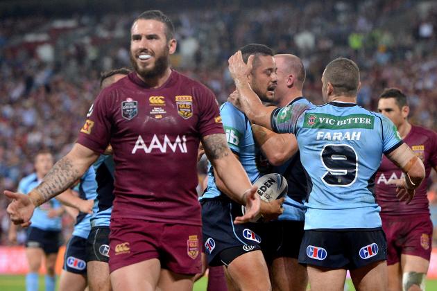 BRISBANE, AUSTRALIA - MAY 28: Jarryd Hayne of the Blues celebrates a try as Darius Boyd of the Maroons complains to the referee during game one of the State of Origin series between the Queensland Maroons and the New South Wales Blues at Suncorp Stadium on May 28, 2014 in Brisbane, Australia.  (Photo by Bradley Kanaris/Getty Images)