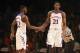 Nov 30, 2013; Paradise Island, BAHAMAS; Kansas Jayhawks guard Andrew Wiggins (22) and center Joel Embiid (21) react after a score during the game against the UTEP Miners at the 2013 Battle 4 Atlantis in the Imperial Arena at the Atlantis Resort. Mandatory Credit: Kevin Jairaj-USA TODAY Sports