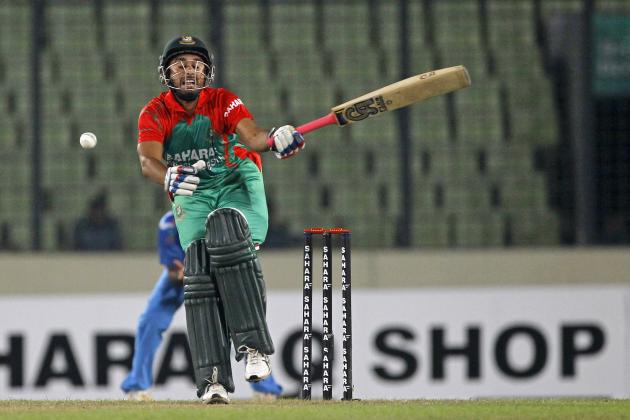 Bangladesh's Mithun Ali reacts after missing a ball during their second one-day International cricket match against India in Dhaka, Bangladesh, Tuesday, June 17, 2014. (AP Photo/A.M. Ahad)