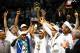 SAN ANTONIO, TX - JUNE 15: The San Antonio Spurs celebrate with the Larry O'Brien trophy after defeating the Miami Heat to win the 2014 NBA Finals at the AT&T Center on June 15, 2014 in San Antonio, Texas. NOTE TO USER: User expressly acknowledges and agrees that, by downloading and or using this photograph, User is consenting to the terms and conditions of the Getty Images License Agreement. (Photo by Andy Lyons/Getty Images)