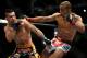 Jose Aldo, right, of Brazil and Ricardo Lamas of Chicago, IL fight in the second round of the Ultimate Fighting Featherweight Championship Mix Martial Arts bout in Newark, N.J. on Saturday, Feb. 1, 2014. Aldo won by unanimous decision in five rounds. (AP Photo/Tim Larsen)