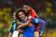 FORTALEZA, BRAZIL - JUNE 17: Goalkeeper Guillermo Ochoa of Mexico celebrates with Javier Aquino after their 0-0 draw with Brazil during the 2014 FIFA World Cup Brazil Group A match between Brazil and Mexico at Castelao on June 17, 2014 in Fortaleza, Brazil. (Photo by Laurence Griffiths/Getty Images)