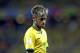 Brazil's Neymar looks down during the group A World Cup soccer match between Brazil and Mexico at the Arena Castelao in Fortaleza, Brazil, Tuesday, June 17, 2014. (AP Photo/Andre Penner)