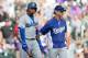 DENVER, CO - JUNE 7: Manager Don Mattingly consoles Hanley Ramirez #13 of the Los Angeles Dodgers after Ramirez struck out during the ninth inning against the Colorado Rockies at Coors Field on June 7, 2014 in Denver, Colorado. The Rockies defeated the Dodgers 5-4 in 10 innings to end their eight game losing streak. (Photo by Justin Edmonds/Getty Images)