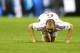 Spain's Andres Iniesta sinks to his knees during the group B World Cup soccer match between Spain and the Netherlands at the Arena Ponte Nova in Salvador, Brazil, Friday, June 13, 2014. (AP Photo/Manu Fernandez)