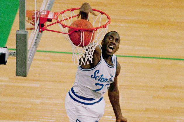 Seton Hall's John Morton slams home two of his 35 points he scored in a losing effort Monday night in the championship game of the NCAA Final Four tournament in Seattle's Kingdome, April 4, 1989. Morton led all scorers and led the comeback as Seton Hall tied the game in regulation but lost, 80-79, on two free throws by Michigan's Rumeal Robinson. (AP Photo/Gary Stewart)
