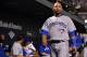 Jun 13, 2014; Baltimore, MD, USA; Toronto Blue Jays first baseman Edwin Encarnacion (10) walks through the dugout during the sixth inning against the Baltimore Orioles at Oriole Park at Camden Yards. Mandatory Credit: Tommy Gilligan-USA TODAY Sports