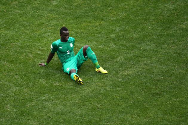 BRASILIA, BRAZIL - JUNE 19: Arthur Boka of the Ivory Coast looks dejected after a 2-1 defeat in the 2014 FIFA World Cup Brazil Group C match between Colombia and Cote D'Ivoire at Estadio Nacional on June 19, 2014 in Brasilia, Brazil. (Photo by Adam Pretty/Getty Images)