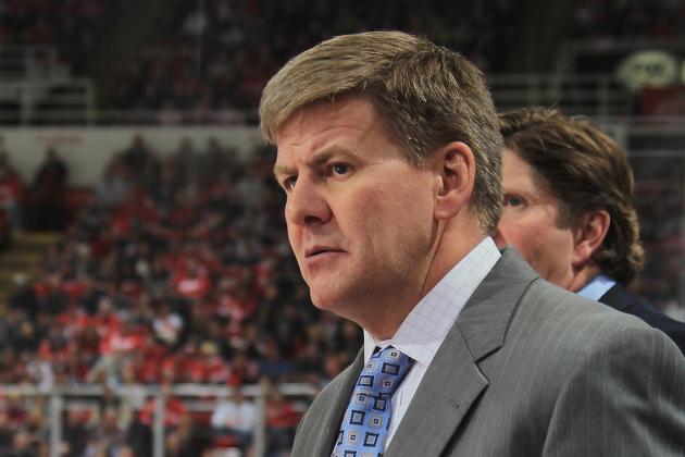 DETROIT, MI - FEBRUARY 10: Assistant coach Bill Peters of the Detroit Red Wings follows the play from the bench during a NHL game against the Los Angeles Kings at Joe Louis Arena on February 10, 2013 in Detroit, Michigan. Detroit defeated Loas Angeles 3-2 (Photo by Dave Reginek/NHLI via Getty Images)