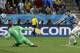 Uruguay's Luis Suarez scores his side's second goal during the group D World Cup soccer match between Uruguay and England at the Itaquerao Stadium in Sao Paulo, Brazil, Thursday, June 19, 2014. (AP Photo/Matt Dunham)