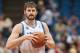 Apr 8, 2014; Minneapolis, MN, USA; Minnesota Timberwolves forward Kevin Love (42) grabs the ball pre game at Target Center. Mandatory Credit: Brad Rempel-USA TODAY Sports