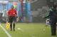 FILE - the June 13, 2014 file photo shows assistant referee Humberto Clavijo from Colombia argue ingwith Mexico's head coach Miguel Herrera, right, during the first half of the group A World Cup soccer match between Mexico and Cameroon in the Arena das Dunas in Natal, Brazil. FIFA has replaced the Colombian assistant referee whose offside decisions denied Mexico two potential goals against Cameroon. FIFA said Humberto Clavijo will not be in referee Wilmar Roldan's team for South Korea vs. Algeria in Porto Alegre on Sunday. (AP Photo/Eduardo Verdugo, file)