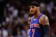Apr 6, 2014; Miami, FL, USA; New York Knicks forward Carmelo Anthony (7) walks back to the bench during the second half against the Miami Heat at American Airlines Arena. Miami won 102-91. Mandatory Credit: Steve Mitchell-USA TODAY Sports
