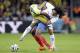Honduras' Roger Espinoza, right, battles for the ball with Ecuador's Walter Ayovi during the group E World Cup soccer match at the Arena da Baixada in Curitiba, Brazil, Friday, June 20, 2014. (AP Photo/Michael Sohn)
