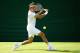 LONDON, ENGLAND - JUNE 21: Roger Federer of Switzerland in action during a practice session during previews for Wimbledon Championships at Wimbledon on June 21, 2014 in London, England. (Photo by Al Bello/Getty Images)